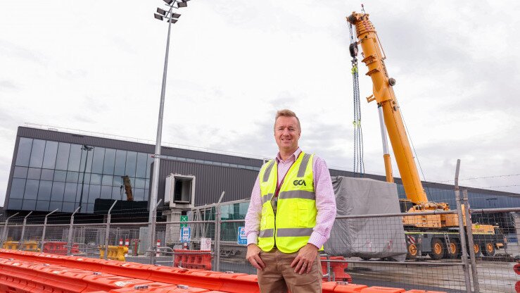 QAL CEO Chris Mills at Gold Coast Airport terminal expansion 